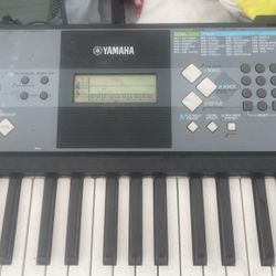 Yamaha Piano & Stand