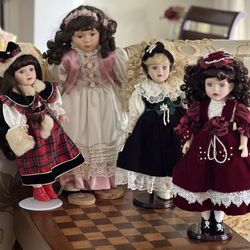 Four 1990’s Vintage Porcelain Dolls