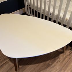 Triangular coffee table (48”x30”)