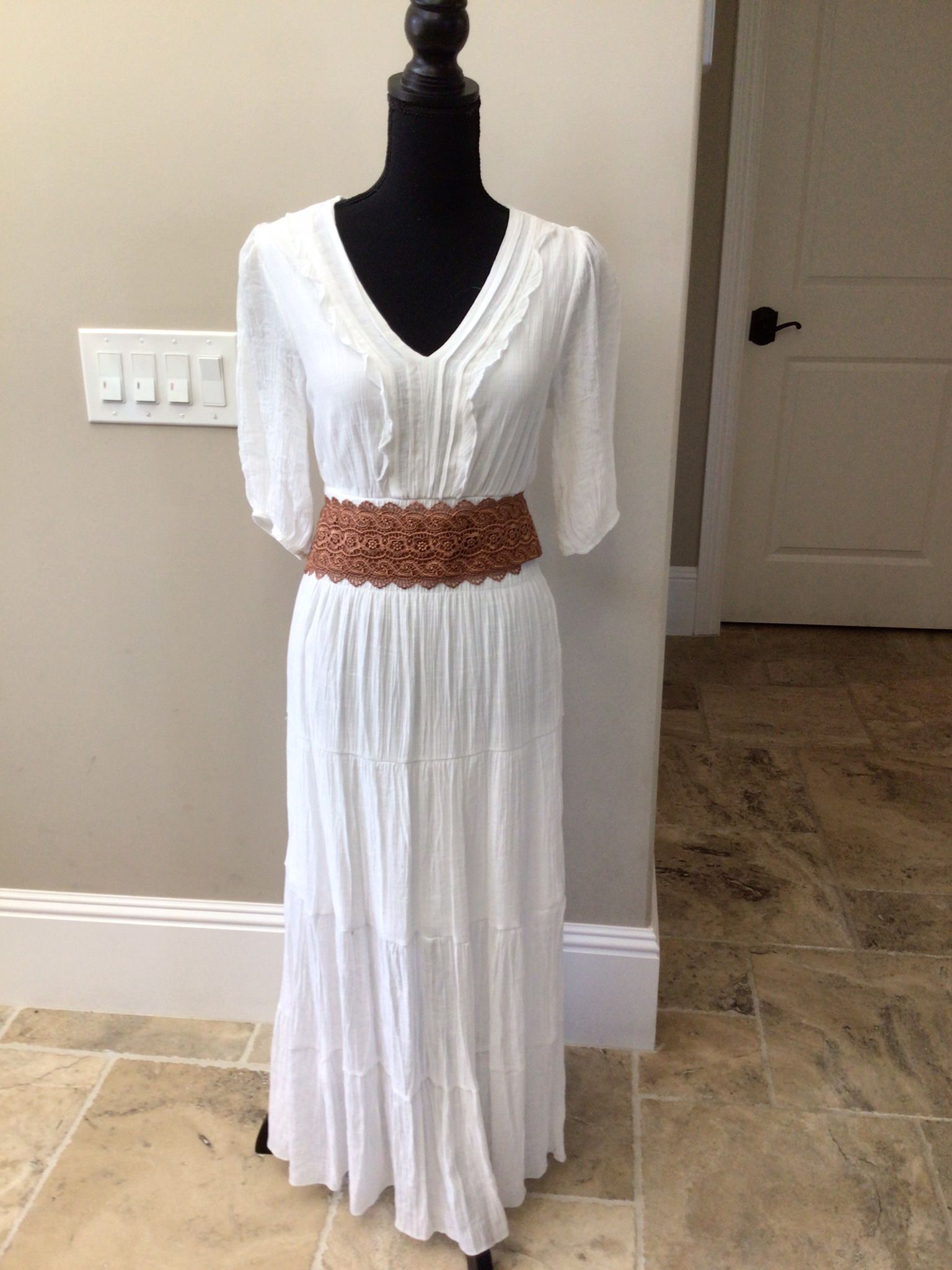 White Dress With Ruffle Detail And Belt