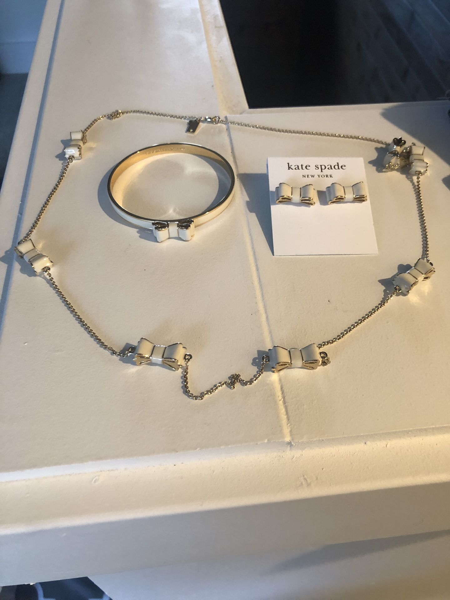 Kate Spade marching off white jewelry set