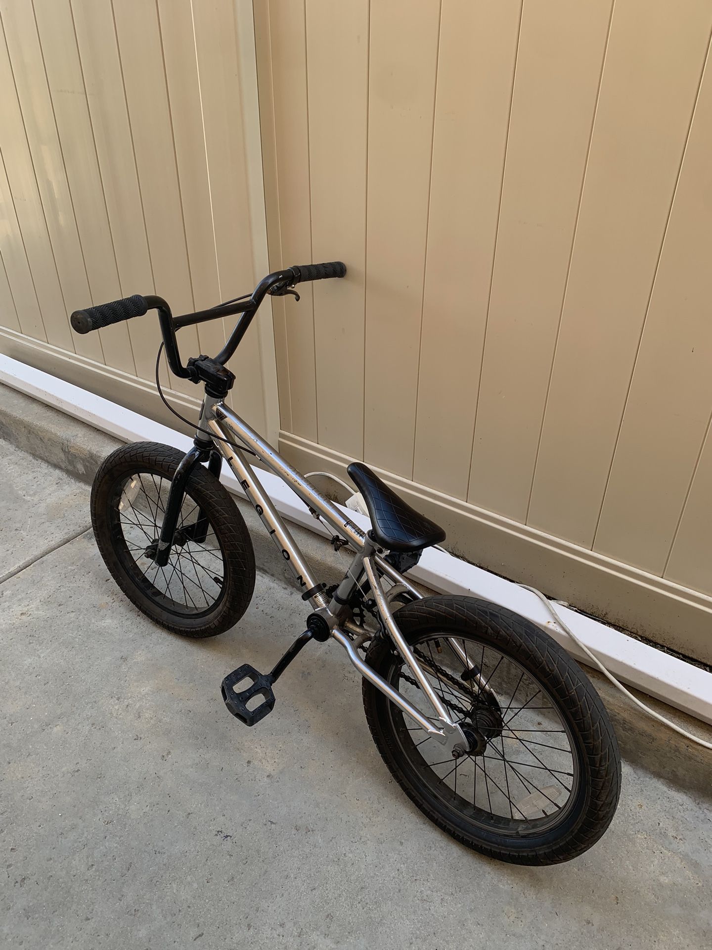 silver and black mongoose legion bmx bike.