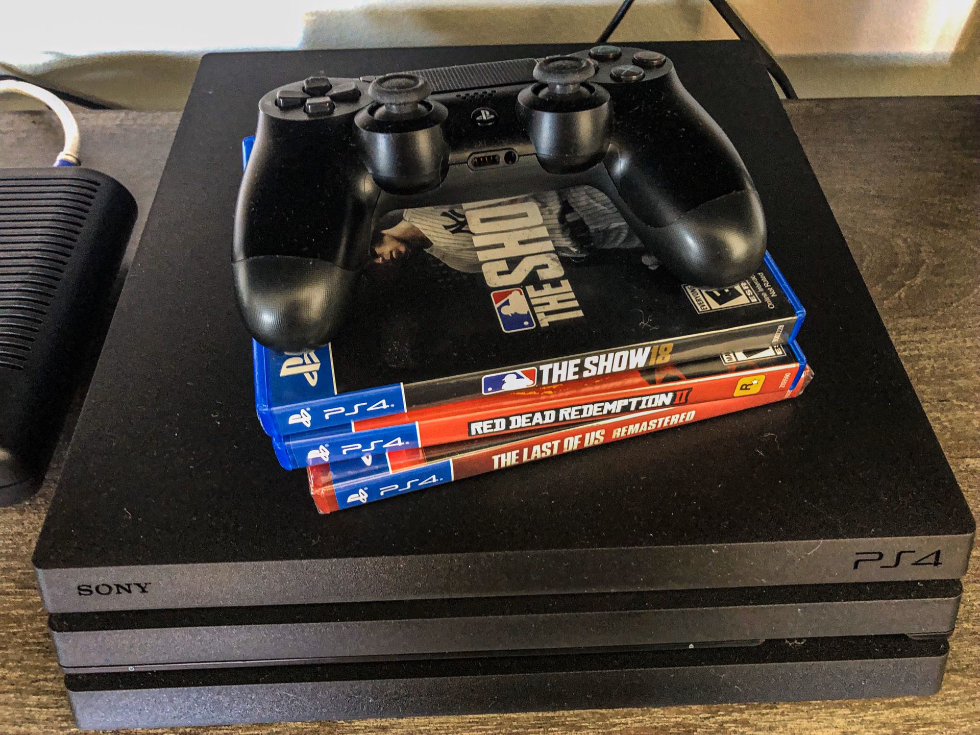 PS4 w/ 1 controller and 3 games