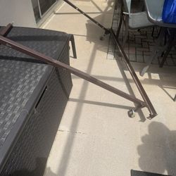 QUEEN BEDFRAME ON WHEELS $15