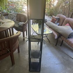 Floor lamp with shelves