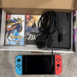 Nintendo switch + 2 Games + 128gb Storage