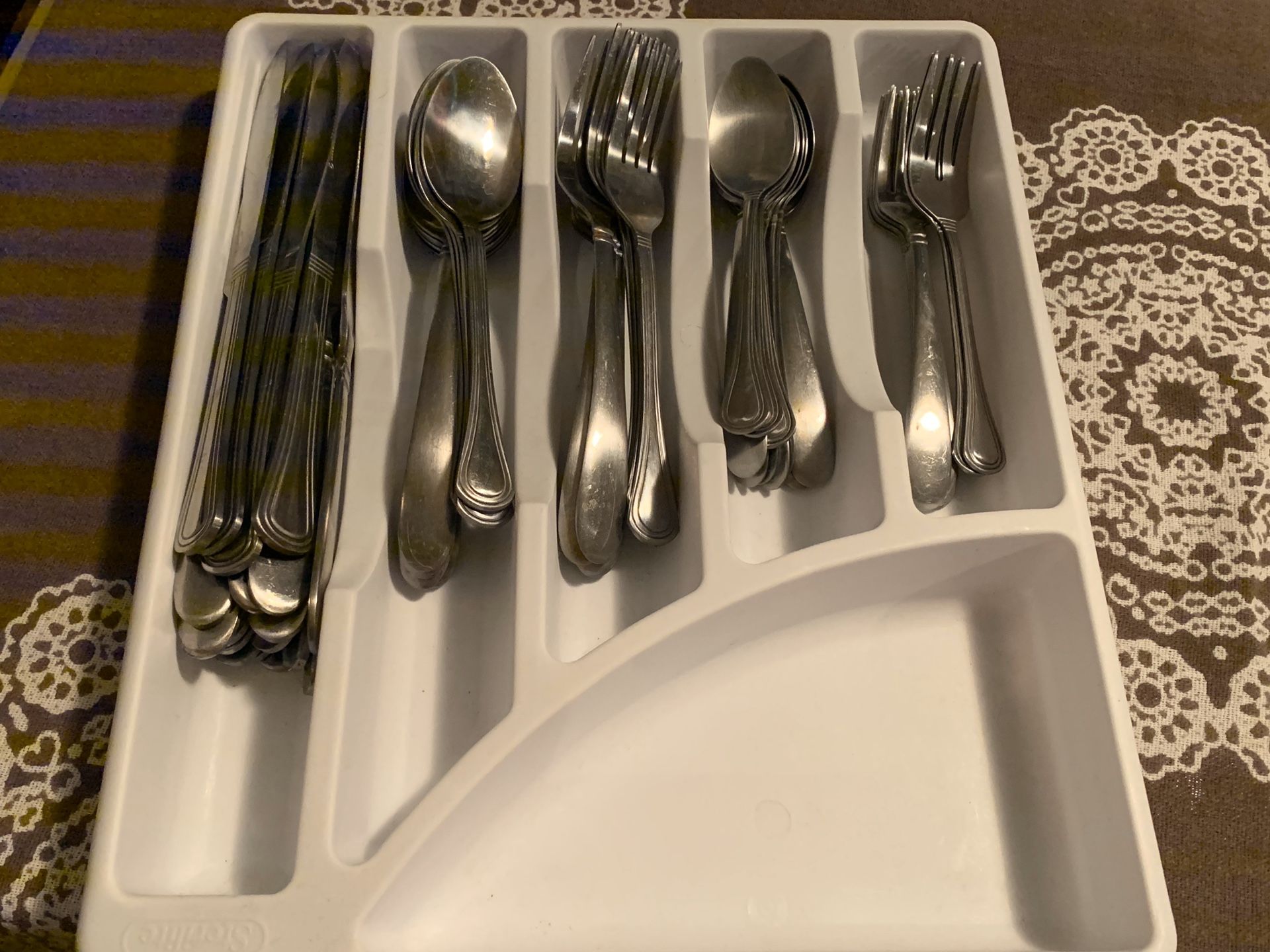 Silverware, paper towel holder, and other kitchen items