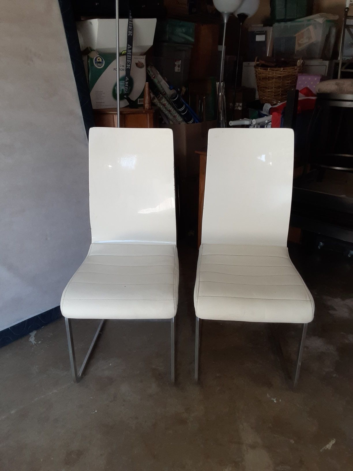 2 white chairs