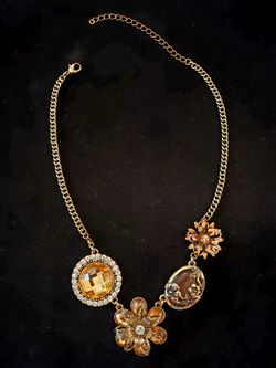 $10. Victorian style flower statement necklace. Rhinestones. Gold tone. 16-in choker with 3-in extender.
