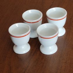 Set of 4 Vintage Porcelaine Egg Cup Holder Coquetier Made in France
The design is the same as D'Auteuil Service Bistrot Jacques Lobjoy  