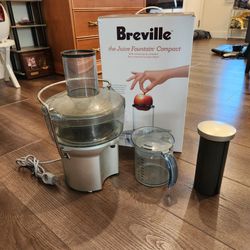 Breville Juice Fountain Compact BJE200XL centrifugal juicer in silver, works great