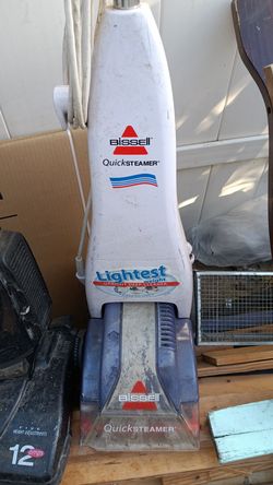 Bissell Quick Steamer with  one carpet shampoo