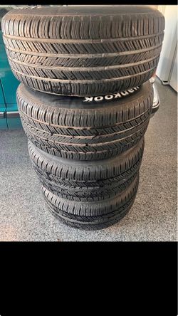 15x10 5 lug obs rims and tires with center caps