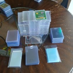 63 Used 1 Touches, Around 100 Used Top Loaders And A Pack And A 1/4 Penny Sleeves