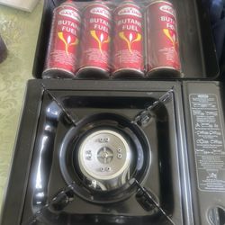Mini Camping Stove With Four Full Cans