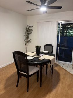 FOR SALE: Black Round Dining Table with 3 Chairs