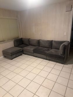 Large Dark Gray L-Shaped Sectional + Ottoman