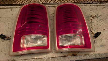 OEM Taillights 13-18 Ram 1(contact info removed) good shape no cracks tail lights pass driver light pair