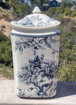222 Fifth Adelaide Blue and White Canister featuring a scenic floral pattern.