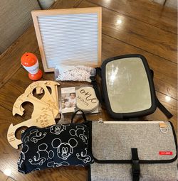 Baby shopping cart cover, changing pad, shusher, car mirror, month display closet hangers, and display month signs.
