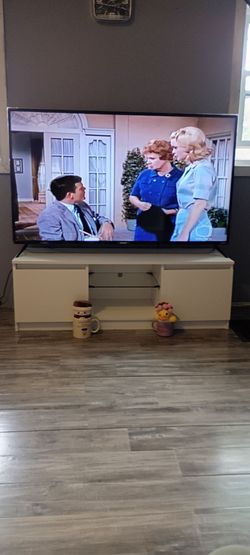 SELLING MY TV STAND ITS TO SMALL FOR MY TV