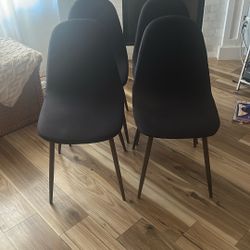 4 Dining Chairs With Black Covers,  Denim Under