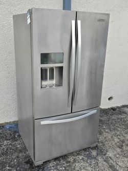 samsung three doors stainless steel refrigerator.
