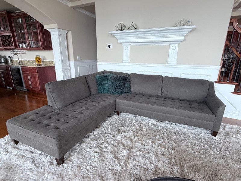 Grey fabric sectional couch