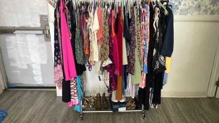 Rack of woman clothes and shoes
