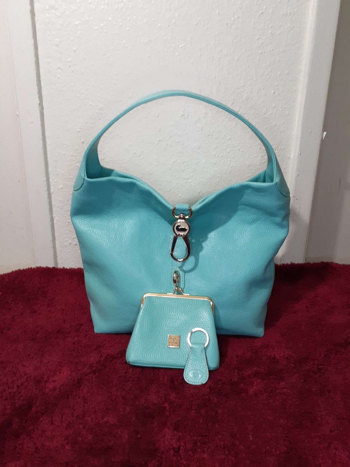 Dononey & Bourke Leather Logo Lock Hobo bag new leather in mint color ,logo reversible lock new,comes with special coin purse and key fob