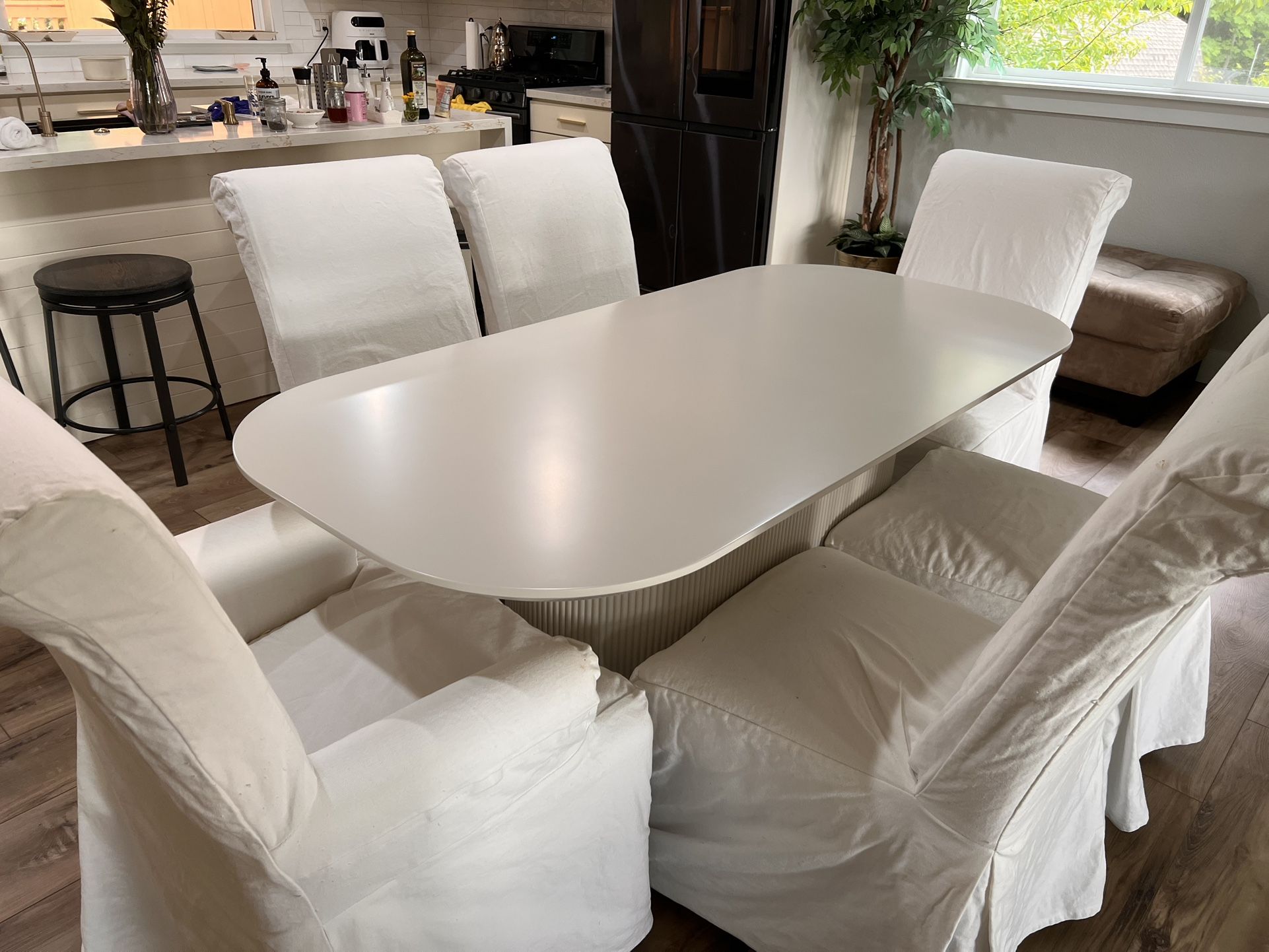 70" Oval Diningx Table, fluted + 6 Pottery barn dining chair.