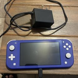 Nintendo switch lite . Mint condition . Only used a few times .