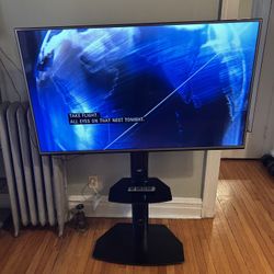 55” LG Flat Screen TV W/Stand And Remote 