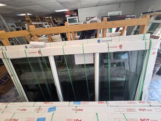 Brand New 90.25W x 59.25H PGT Impact Vinyl Sliding Window