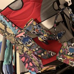 Pocketbook With Hand Carry, And Straps New!! $35..Sock Boots, Worn Once Size 7 $35 Both For $60..See-Through Stretch Pants (NewLong) Size S/M $15