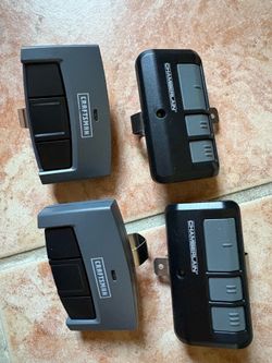 Like new condition garage door remote controls from Craftsman and Chamberlain