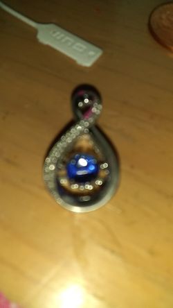 Sterling silver pendant with blue stone