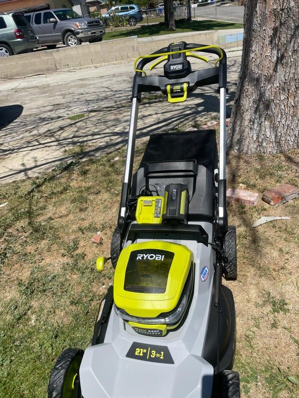 RYOBI40V HP Brushless 21 in. Cordless Battery Walk Behind Self PropelledLawn Mower with (1) 6.0 AhBatteries and Charger