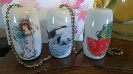 2 vintage Handpainted porcelain pulleys