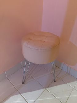 2 pink leather stool chairs