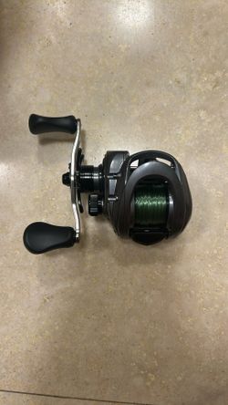 Left hand retrieve baitcaster