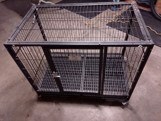 $100 rolling dog kennel