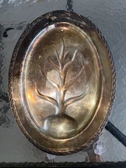 Decorative Silver Embossed Oval Serving Tray. Is tarnished & has a tape mark/residue