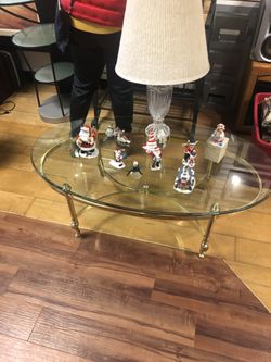 Glass coffee table with gold stand