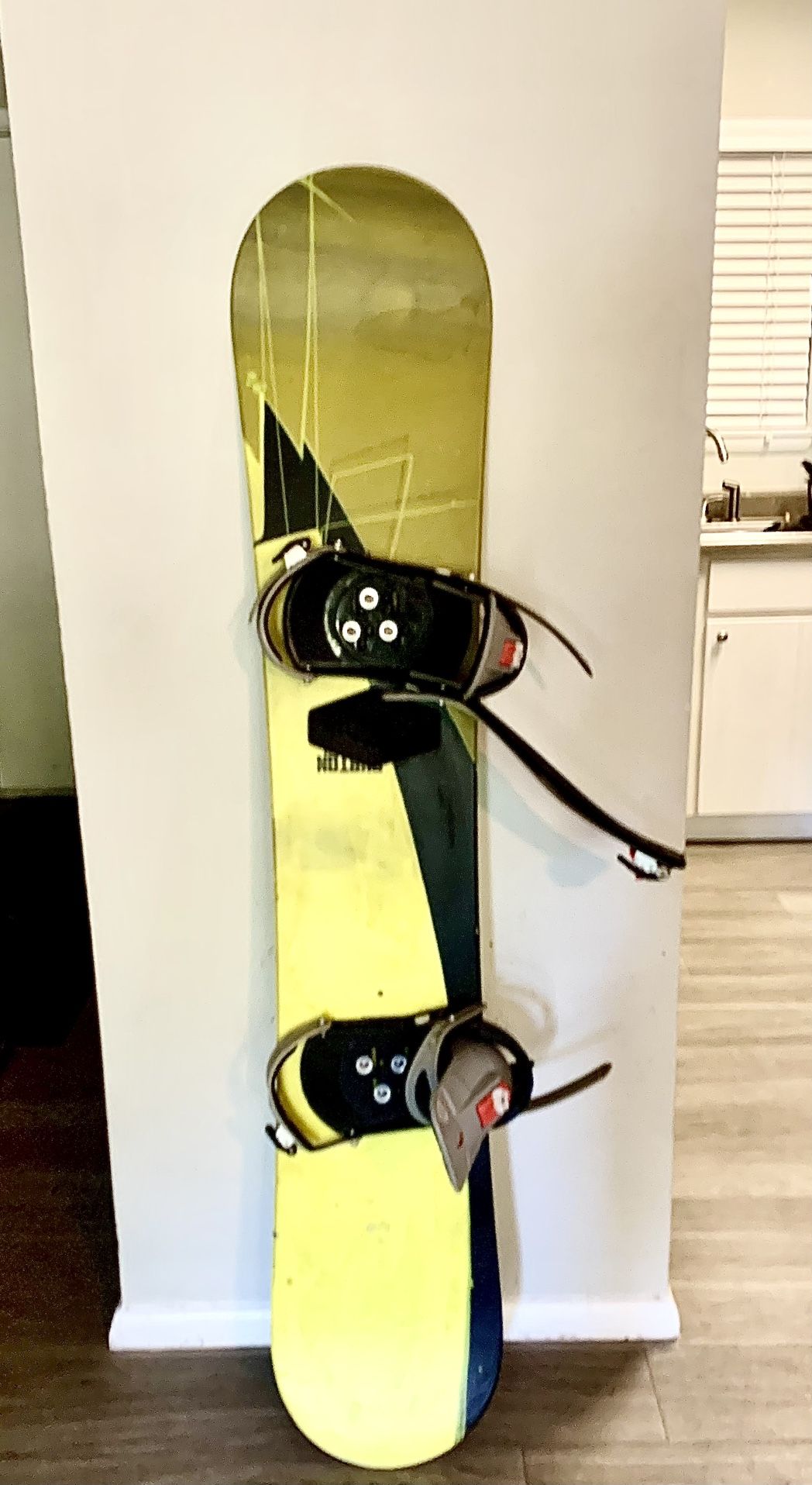 Snowboard With Helmet and Goggles
