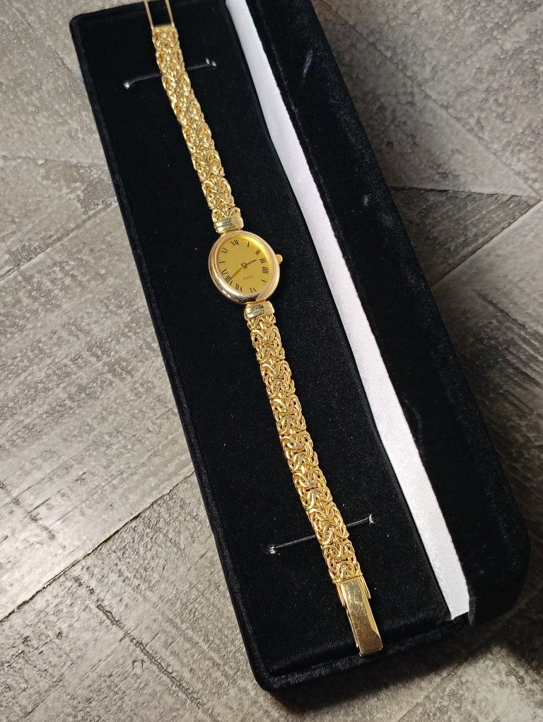 Ladies 14kt Quartz Byzantine Watch.