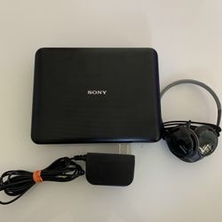  Sony DVP-FX750 7-Inch Portable DVD Player, Black + Philips Rich Bass Lightweight Neckband Headphones SHS5200