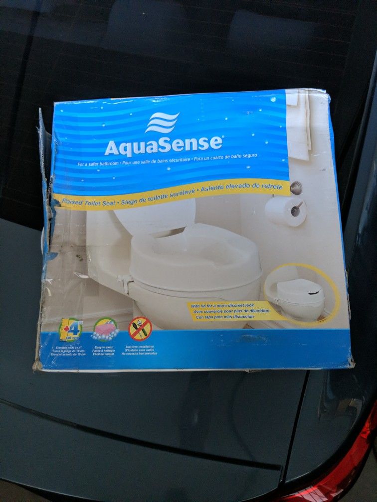 Raised Toilet Seat With Lid