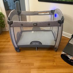 Playpen play and go portable crib