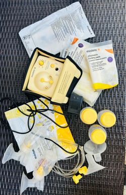 Medela breast pump plus accessories